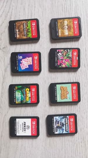Nintendo Switch Lite бирюзовая + чехол + 8 игр image 2 blur bg