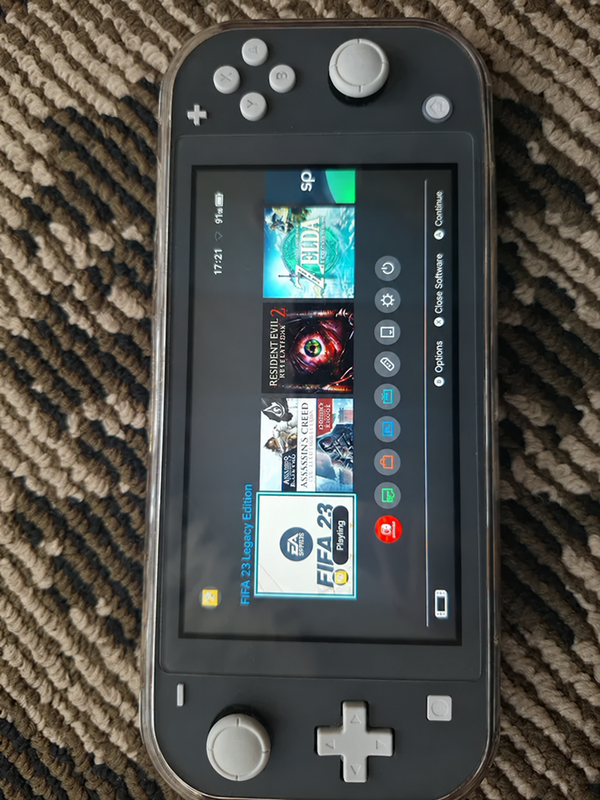 Nintendo Switch Lite, прошитая + карта 128 ГБ blur bg