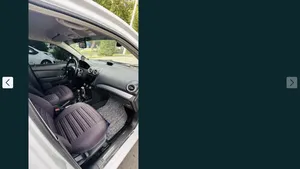 Chevrolet Nexia 3 image 4 blur bg