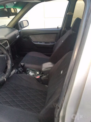 Chevrolet Nexia 2 image 5 blur bg