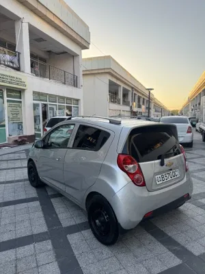 Chevrolet Spark 2012 used image 3 blur bg