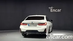 BMW 3 Series image 2 blur bg